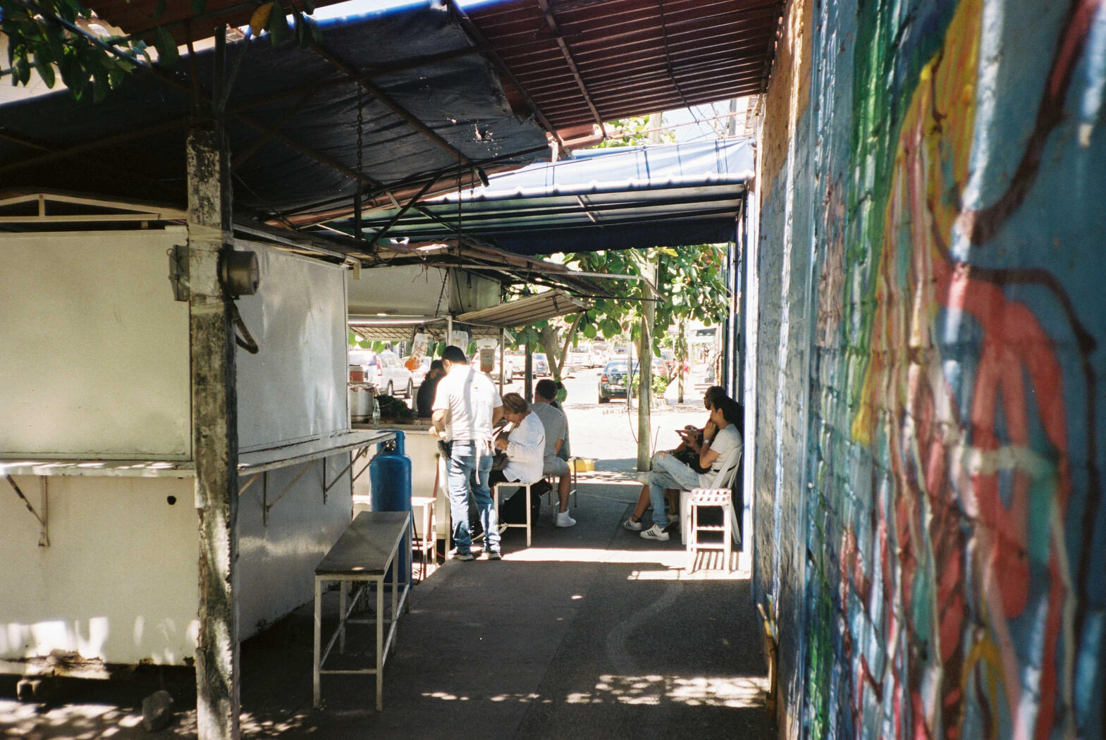 Residents enjoying their lunch at a stall
