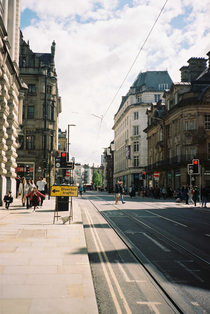 Historic buildings with pedestrians walking